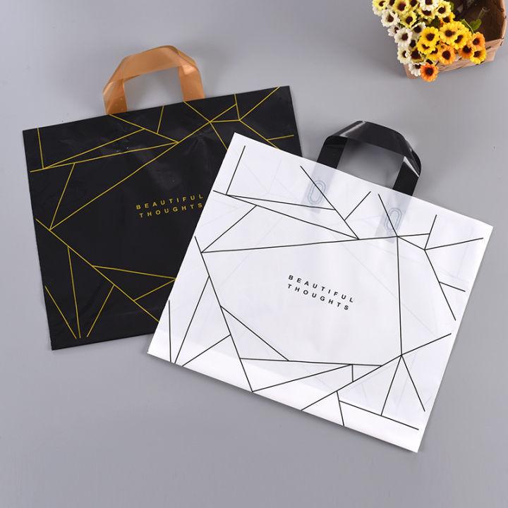 plastic clothing store shopping bags creative high pressure clothes packaging tote bags clothing store bags wholesale printing logo