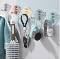 Multifunctional bathroom wall shelf free punching seamless trace rack rotating hook strong 3 branch rotating sticky hook.