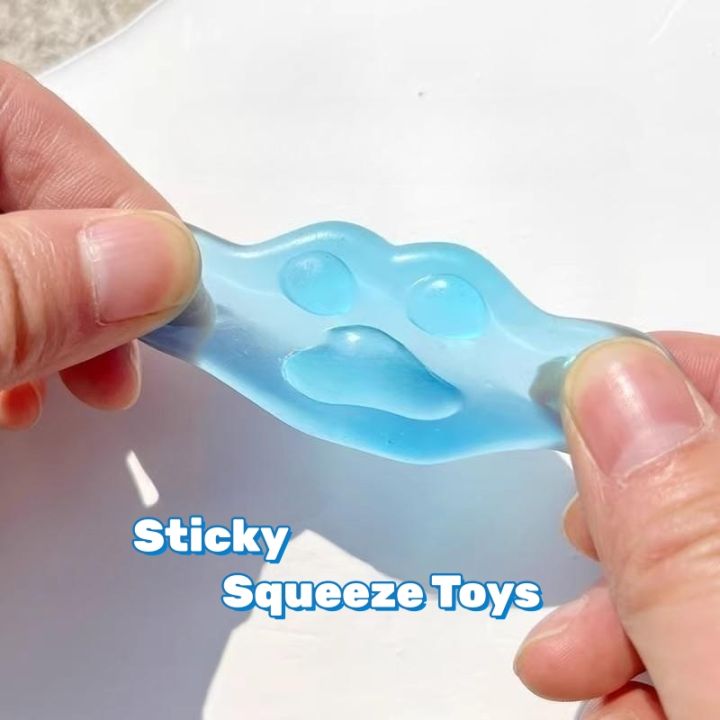 Kawaii%20Cat%20Paw%20Sticky%20Squeeze%20Toy%20Soft%20Realistic%20Jelly%20Glitter%20Cat's%20Claw%20Squishy%20Stress%20Relief%20Toys%20Kids%20Adults%20Unique%20Gifts%20-%20Image%203