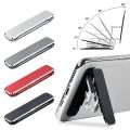 Folding Mini Metal Phone Holder Aluminum Alloy Back Stick Invisible Portable Bracket Universal Mobile Desktop Phone Bracket. 