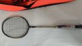 Skalo badminton racket black-gold-color. 