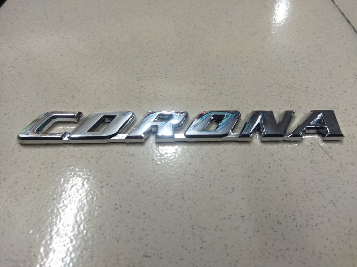 CORONA"%20chrome%20emblem,%20likely%20for%20a%20car.%20This%20is%20a%20car%20monogram%20or%20badge,%20commonly%20used%20on%20Toyota%20Corona%20vehicles.%20-%20Image%204