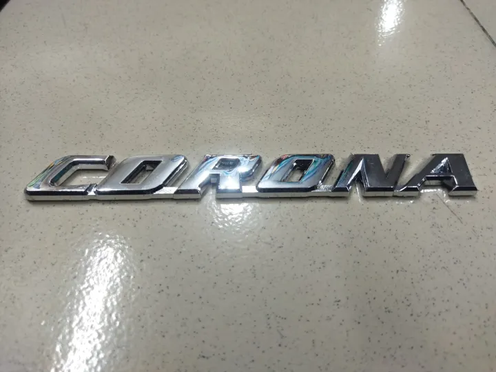 CORONA"%20chrome%20emblem,%20likely%20for%20a%20car.%20This%20is%20a%20car%20monogram%20or%20badge,%20commonly%20used%20on%20Toyota%20Corona%20vehicles.%20-%20Image%204