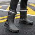 The new rain boots men's work kitchen anti-slip water shoes can be worn in all seasons waterproof rain boots can be worn outside the work vegetable field fashion shoes. 