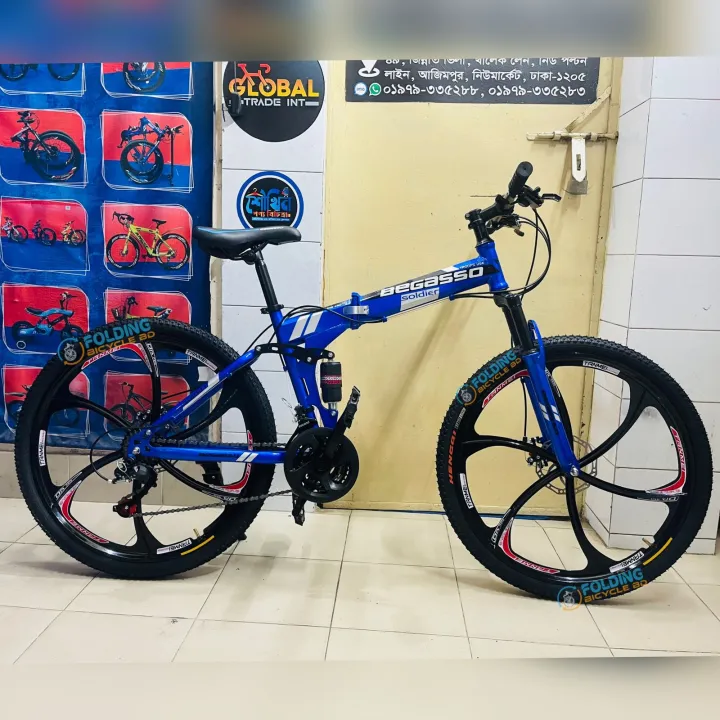 Begasso%20Folding%20Bicycle%20%7C%2026%20Inch%20%7C%20Alloy%20Wheel%20%7C%206%20Nives%20%7C%20Double%20Suspension%20%7C%20Shimano%20Gear%20&%20Brake%20%7C%20Double%20Disk%20Brake%20%7C%20Blue%20color.%20-%20Image%203