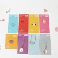 KPOP BTS BT21 Cartoon Bracelet Necklace Keychain Brooch Metal Charm Phone Straps. 
