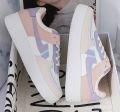 Women's Purple Sneakers. 