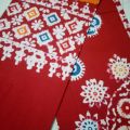 Red & orange colour combined mombatic bedsheets. 