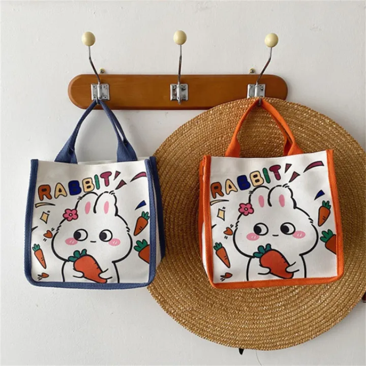 Lightweight%20Bunny%20Canvas%20Bag%20Eco-friendly%20Durable%20handles%20Canvas%20Cartoon%20Tote%20Bag%20Printed%20Design%20Cute%20Lunch%20Bag%20for%20Casual%20Outings%20School%20Accessory%20Female%20Students%20Lunch%20Storage%20Gift%20option%20-%20Image%205