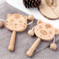 Wooden cartoon tambourine toy, newborn baby can chew and shake drum, traditional children's early education hand ringing the bell. 