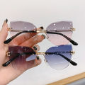 2023 New Ladies Cat Ear Sunglasses Classic Rimless Gradient Sunglasses High Quality Women's Brand Designer Glasses Shadow UV400.
