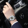 Chino full-automatic mechanical watch waterproof hollow steel band watch men's and men's watch fashion casual bottom watch. 