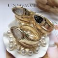Unique Snake Shaped Watches for Women with Rhinestone Fashion Luxury Brand Ladies Watch Diamond Snake Bracelet Wrist Watch Girl. 
