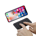 Mini Bluetooth Wireless Keyboard Portable Small Hand Keypad for iPhone Android Smart Phone Tablet Laptop PC.