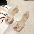 Plastic sandals women's transparent flat non-slip Korean version of beach shoes seaside vacation metal bow fish mouth jelly shoes.