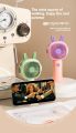 New Handheld Small Fan with Base Cartoon Style Simple Operation Student Mini Home Charging Portable Air Conditioner. 