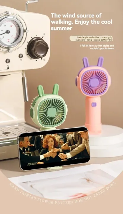 New%20Handheld%20Small%20Fan%20with%20Base%20Cartoon%20Style%20Simple%20Operation%20Student%20Mini%20Home%20Charging%20Portable%20Air%20Conditioner%20-%20Image%206