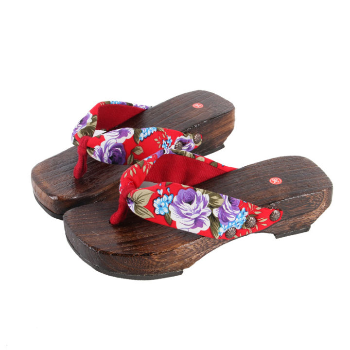 Factory sales of Japanese flip-flops, women's roasted paulownia clogs, flat bottoms, angle sandals, anti-slip wear-resistant wooden slippers, medium and high soles