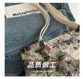 Large capacity one-shoulder handbag  new niche ins canvas bag lazy style tote class commuter bag. 