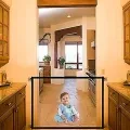 Magic Gate Portable Folding Mesh Baby Safety Fencing Gate Protection Indoor and Outdoor Safe Guard for Kids and Pets. 