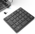 Wireless Numeric Keypad 26-key portable 2.4 GHz Numeric Keypad for Finance and Accounting for Windows. 