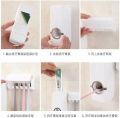 Automatic Toothpaste Dispenser -Toothbrush Holder.