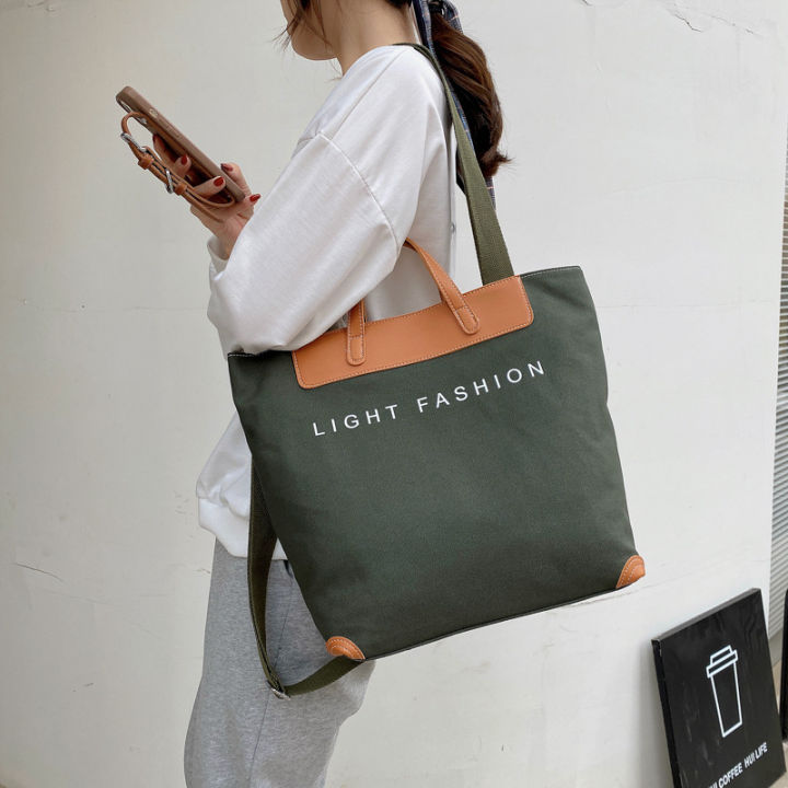 Bag%20crossbody%20canvas%20tote%20new%20fashion%20ladies%20korean%20handbag%20casual%20commuter%20shoulder%20bag%20women's%20big%20bag%20ins%20-%20Image%204