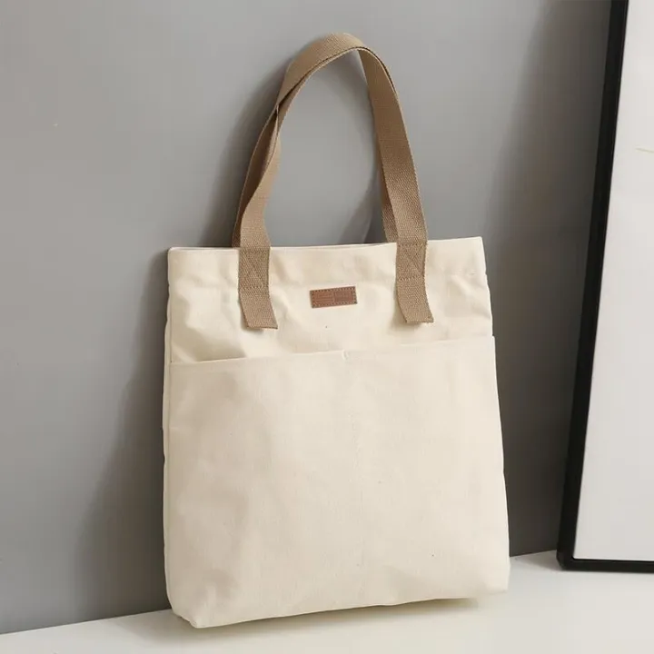 TAG%20Lifestyle%20Canvas%20Tote%20Bag/Fashionable%20Top%20Handle%20Olive%20Green%20Color%20With%202%20Big%20Outside%20Pocket%20and%20Zipper%20Enclosure%20for%20girls%20For%20University/College/Trendy%20Fashionable%20Women%20-%20Image%204