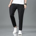 New Men'S Korean Fashion Casual Summer Thin Quick Drying Ice Silk Straight Pants Loose Sports 9-Point Trousers Boy. 