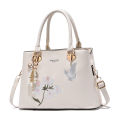Summer new style bag women's fashion bow hanging handbag trend ladies embroidered shoulder crossbody bag mom bag.