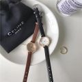 New Fashion Student Women's Watch Women's Simple Niche Retro Belt Small round Palte High-Grade Quartz Women's Watch.