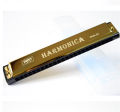 High quality 24-hole polyphonic C swan harmonica wind instrument. 