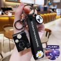 LED Luminous Sound Daisy Camera Pendant Keychain - Creative and Fun. 