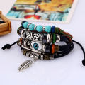 Jewelry beaded multi-layer blue eye cowhide ethnic style feather pendant student bracelet. 