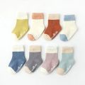 Autumn and winter cotton baby socks for newborn boys and girls elastic rubber non-slip baby pat one five. 