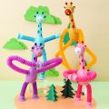 NEW Suction Cup Telescopic Tube Giraffe Toy Kids Versatile Cartoon Puzzle Luminescence LED Decompression Toys Children Birthday Party Gift. 