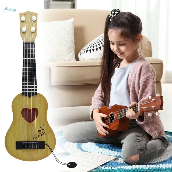 Kids%20Ukulele%20Guitar%20Toy%20Boys%20Brown%2038x12.5cm%20Brown%20-%20Image%204
