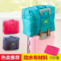 Travel bag, jacquard storage bag, travel storage clothing bag, large finishing bag, waterproof trolley handflower bag in the row. 