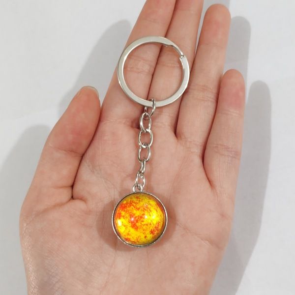 Luminous%20Solar%20System%20Planet%20Key%20chain%20Pendant%20Key%20Ring%20Earth%20Moon%20Saturn%20glow%20in%20the%20dark%20Double%20Side%20Glass%20Ball%20Key%20Chain%20-%20Image%205