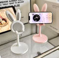 Mobile Phone Holder Can Be Raised And Adjusted.