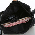 Factory wholesale new men's casual shoulder bag light commuter crossbody bag travel fashion simple small cloth bag. 