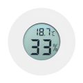 White - Round Digital Humidity and Thermometer.