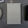 Designer Series Kraft Spiral Grid Graph Notebook. 