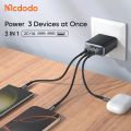 Mcdodo CH-4860 45W 3-Port Fast Charger EU Plug Three Output Ports 2 USB‑C and 1 USB‑A Port Wall Charger - Gearjet. 