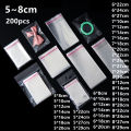 200pcs Width 5cm/6cm/7cm/8cm Transparent Cellophane Bags Candy Chocolate Pack Plastic Pouch Gift Self Adhesive Bag Accessories. 
