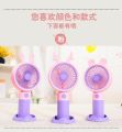 Rechargeable Stylish Cartoon Shape Mini Turbo Fan With Mobile Holder For Indoor & Outdoor Use -  Multicolor. 