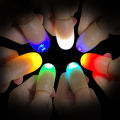 (New)2pc LED light up thumb tip Kuo prank magic party trick prop kid toy. 