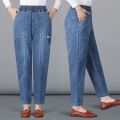 Fashionable mom jeans women's spring and summer harem radish pants high-waisted slim middle-aged casual women's cropped pants. 