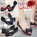 Fish mouth sandals women's summer flat students korean version flower new bow women's shoes jelly shoes transparent crystal shoes.