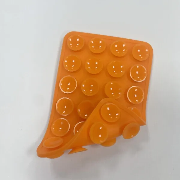 Double%20Sided%20Strong%20Grip%20Silicone%20Phone%20Holder%20%E2%80%93%20Adhesive%20Suction%20Mount,%20Anti-Slip%20Hands-Free%20Stand%20-%20Image%204